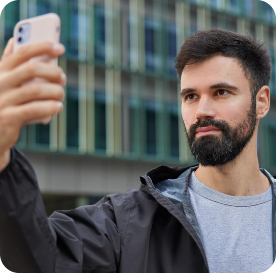 Selfie attendance app compared to traditional biometric fingerprint scanner for employee time tracking