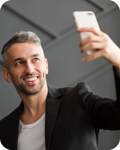 Selfie attendance app compared to traditional biometric fingerprint scanner for employee time tracking